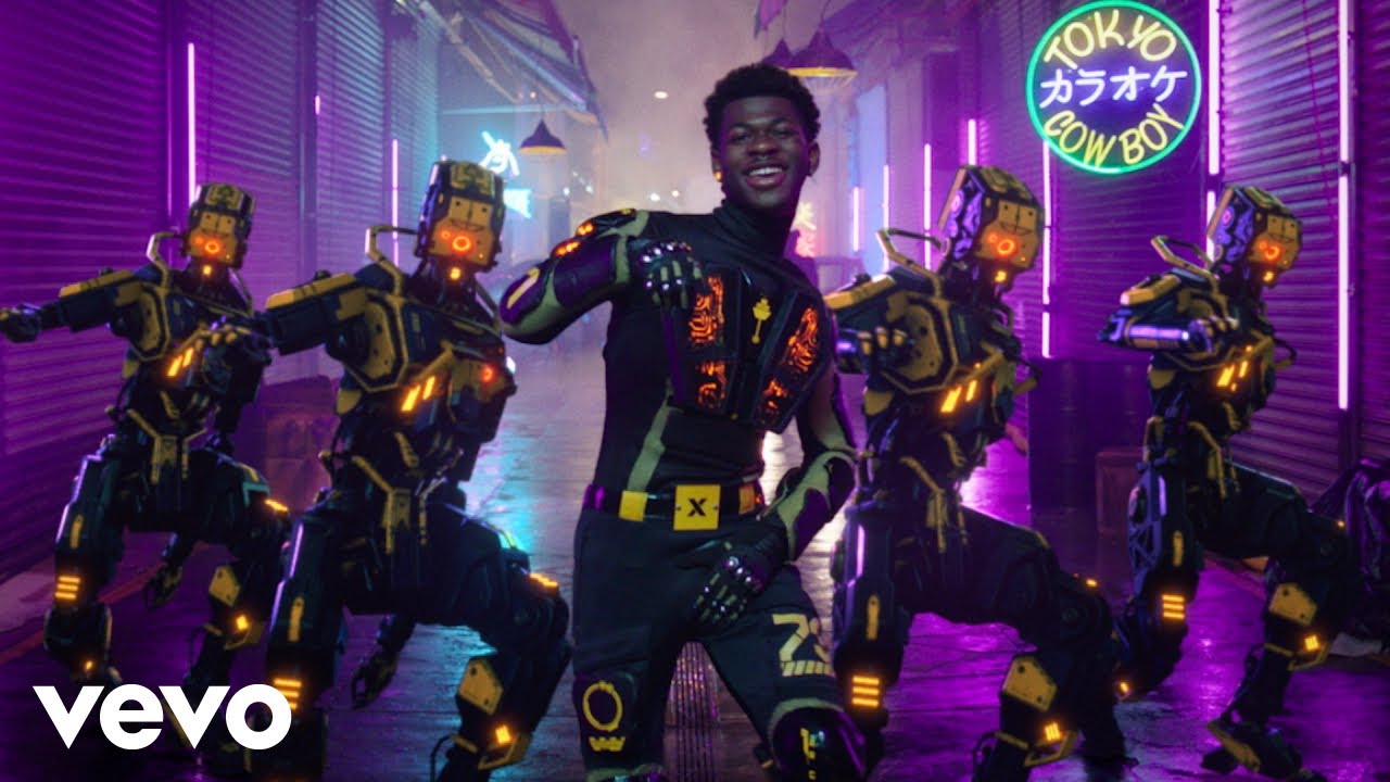 Lil Nas X Sets Aside His Cowboy Hat For a Futuristic Bodysuit inHis New Video