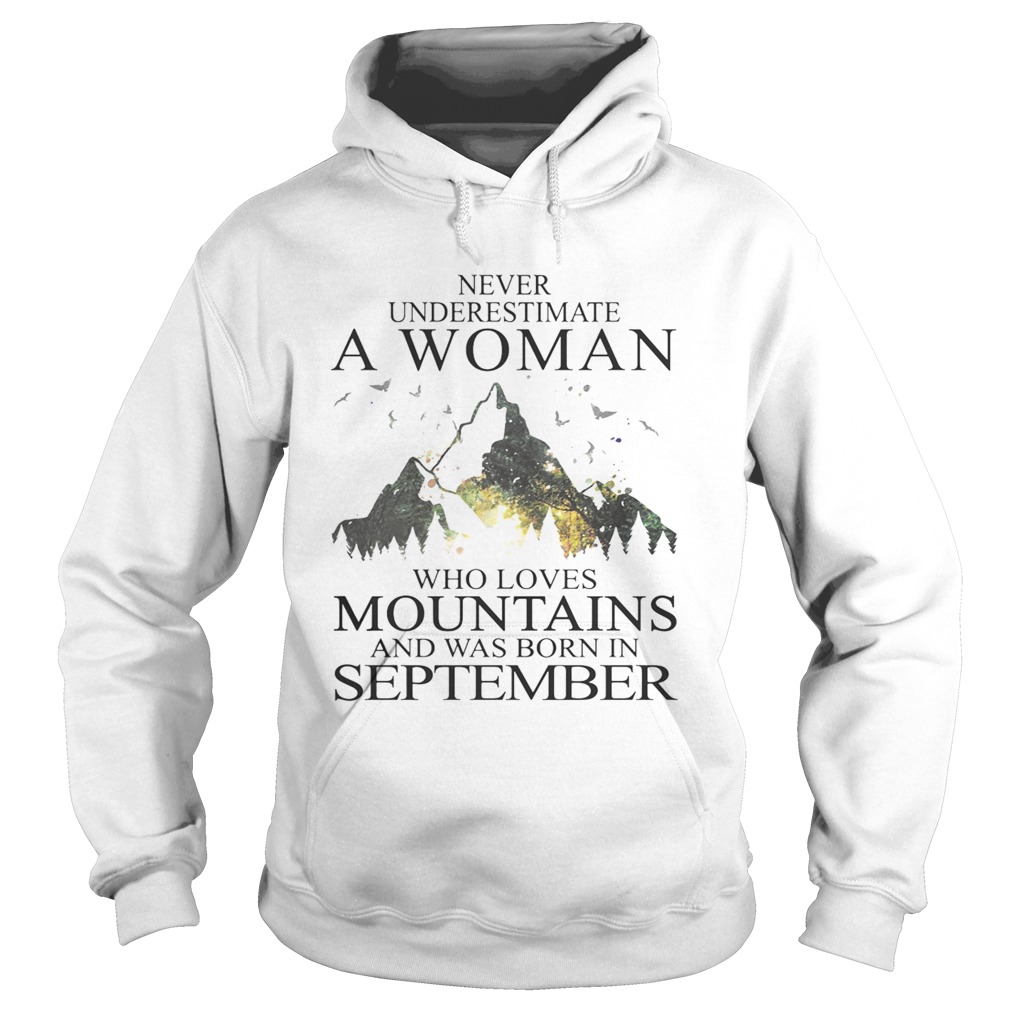 Never underestimate a woman who loves mountains was born in September Hoodie