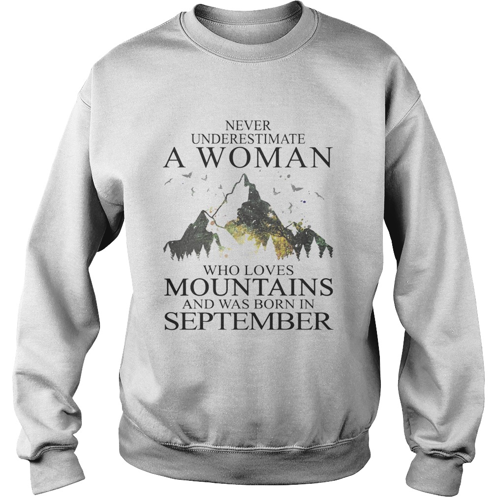 Never underestimate a woman who loves mountains was born in September Sweatshirt